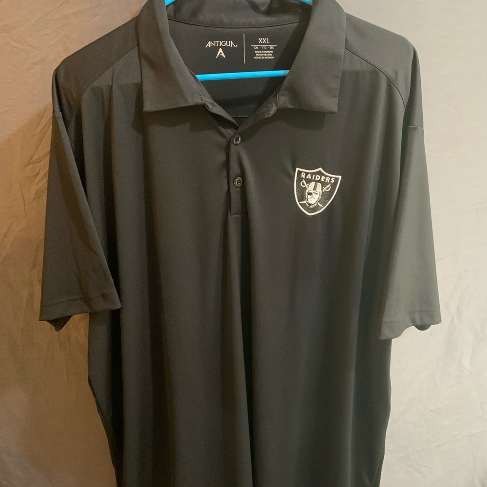Men's Las Vegas Raiders Antigua Black Team Tribute Polo
